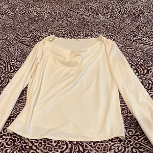White scoop neck, draped long sleeve shirt